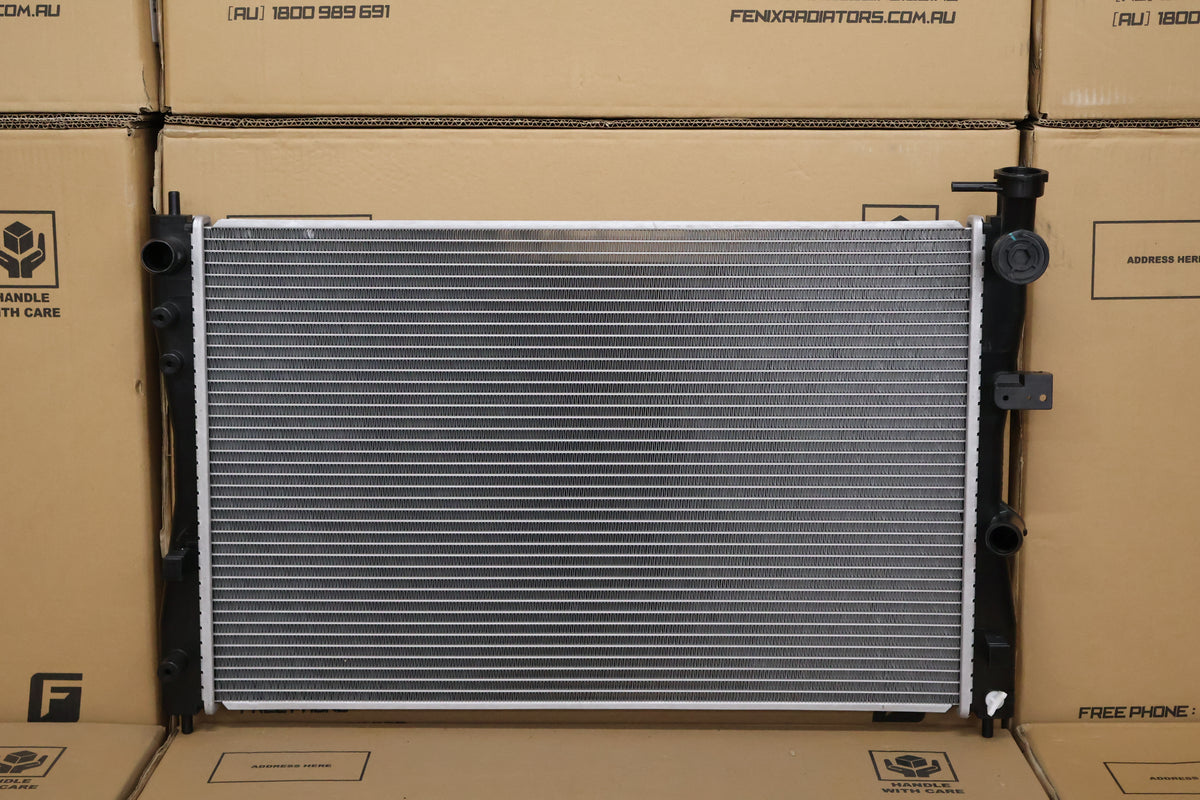 Mitsubishi Colt Radiator (SEP/2004 - JUN/2012). — Fenix Radiators